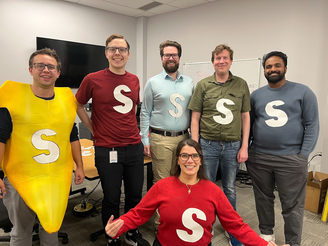 The IT Service Desk team dressed as Skittles on Halloween