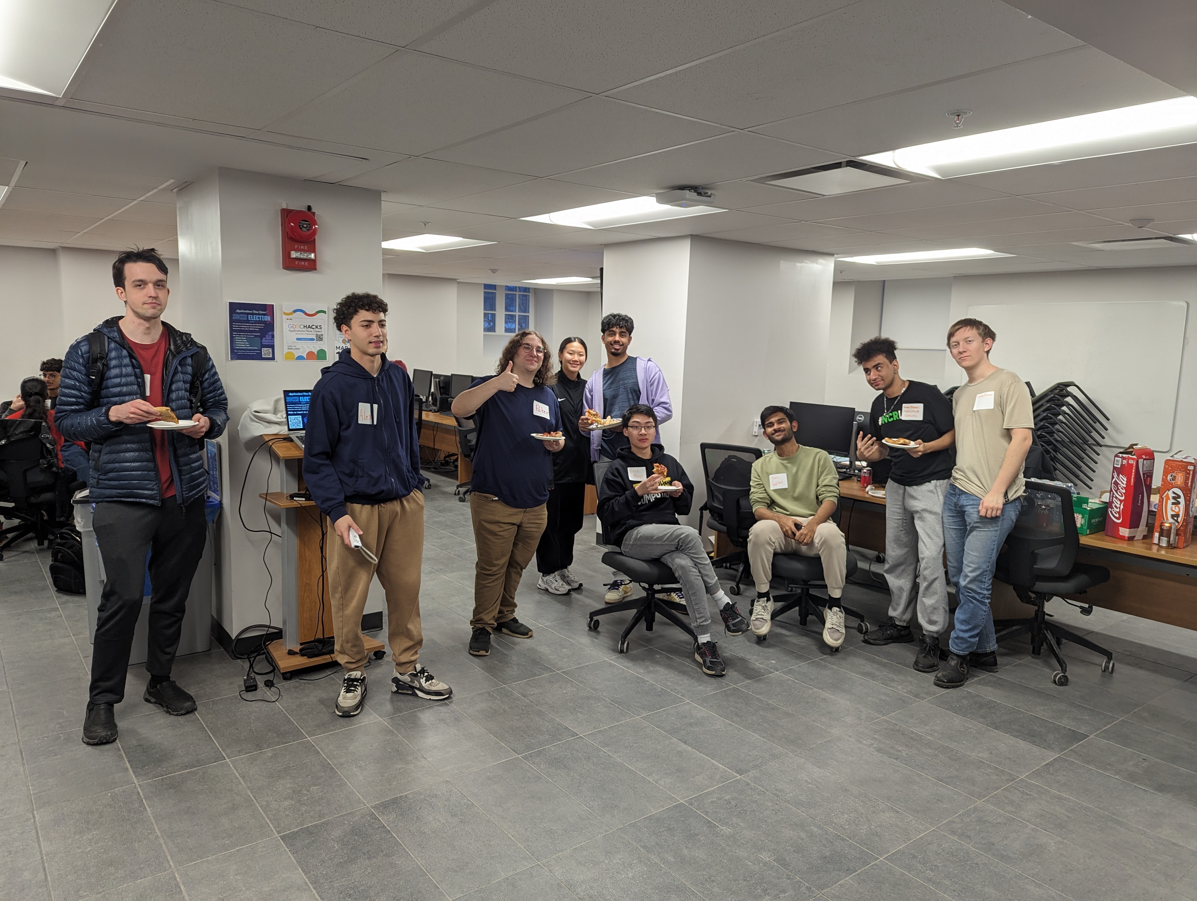 SOCIS members with pizza at an election event